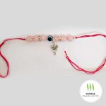 rose quartz crystal rakhi for bhabhi