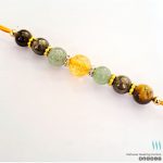money magnet crystal rakhi